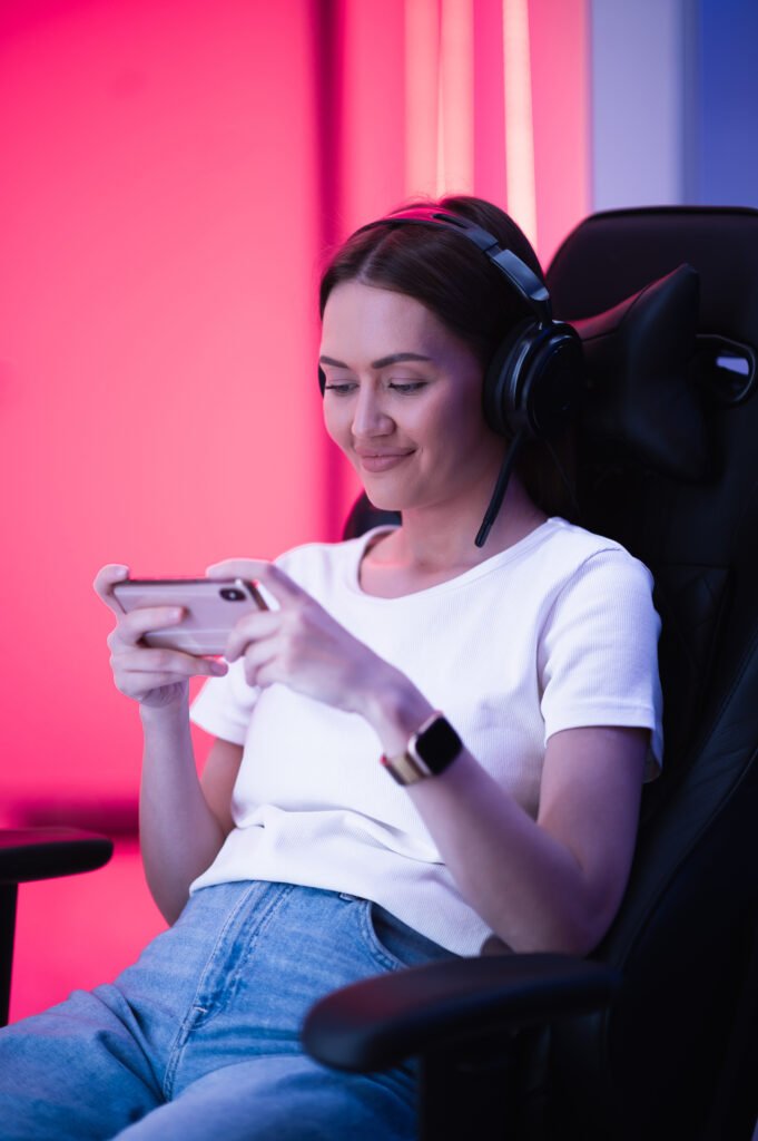 young,female,teenage,cyber,sport,gamer,play,mobile,game,by